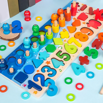 Colorful wooden educational toys with numbers and shapes on a light blue surface